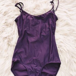 Women’s theatricals leotard in eggplant purple.